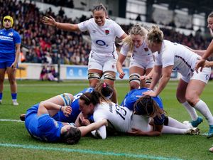 Emily Scarratt scores for England