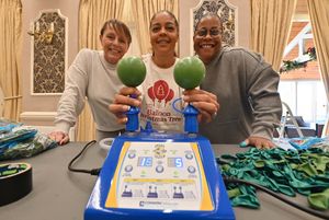 Moor Hall Hotel & Spa, Sutton Coldfield, and Britains first Christmas Tree balloon is under way at being built. Its helping to raise money for charity. In the white T is organiser: Naomi Spencer, With her is: Lisa Corne and Anastasia Powell.