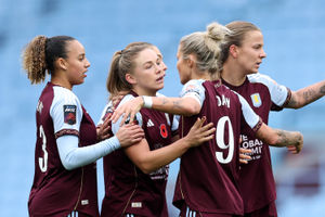 BIRMINGHAM, ENGLAND - NOVEMBER 16: Kirsty Hanson of Aston Villa celebrates scoring her team's first goal with teammates during the Barclays Women's Super League match between Aston Villa and London City Lionesses at Villa Park on November 16, 2025 in Birmingham, England. (Photo by Michael Steele/Getty Images)