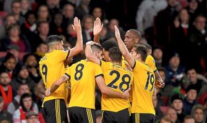 Wolves celebrate taking the lead during an excellent performance against Arsenal (AMA)