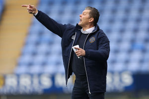 Steve Cotterill the head coach / manager of Shrewsbury Town gestures.