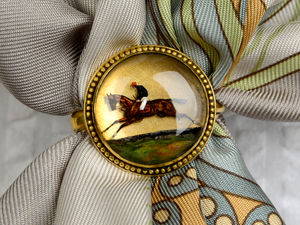 Supporting image for story: Scarf ring depicting former prime minister's horse to be sold