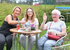 Enjoying tea in the fine weather are Charlotte Bagguley, Harriet Bagguley, and Pauline McKenna, at Bowring Park, in Wellington