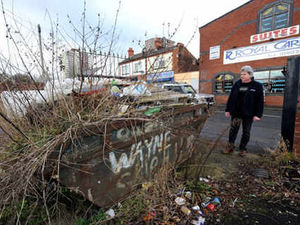 Supporting image for story: Waste festering near busy road