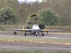 Supporting image for story: WATCH: Dramatic moment plane rips up runway at Wolverhampton Halfpenny Green Airport during take-off
