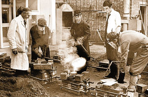 July 4, 1967. The caption reads: 'The foundry industry's training centres are concentrated in the Midlands. This picture is from the craft training centre at West Bromwich where the exercise being supervised is that of pouring molten metal into a mould. Wednesbury College of Technology is the home of the National Foundry College.'
