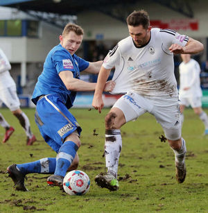 Mark lees of Stockport County and Andy Owens of AFC Telford United