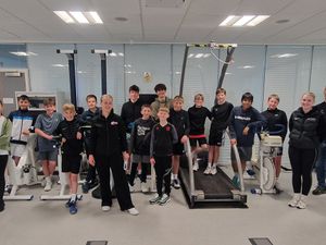 Staff from the University of Staffordshire sport and sciences team with the under-14 county tennis squad