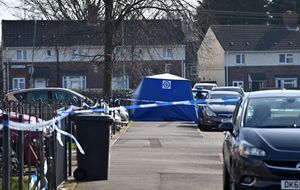 A blue police tent could be seen near Eastfield Grove the day after the shooting