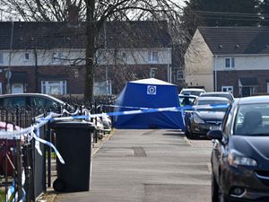 A blue police tent could be seen near Eastfield Grove the day after the shooting