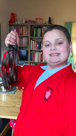 Katie Williams with her hair after she had it shaved off in memory of her dad