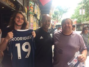 Brendon Batson with two Baggies fans. Photo: Paul Dubberley