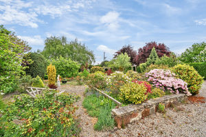Brook House sits within landscaped gardens that extend to around 0.42 of an acre. Picture: Halls. 