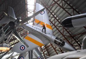 Johnny Sutherland from Totally Wild Access cleans one of the aircraft at RAF Cosford Museum.