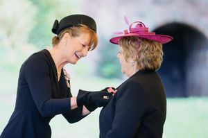 Shropshire Lord-Lieutenant Anna Turner pins a medal to the chest of Margaret Hamer