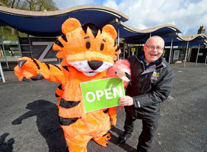 Dudley Zoo and Castle director Derek Grove celebrates reopening with Jambi the zoo mascot