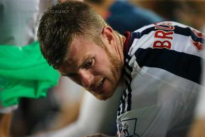 Chris Brunt of West Bromwich Albion takes a breather on the bench.