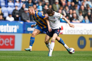 Killian Phillips of Shrewsbury Town and MJ Williams of Bolton Wanderers (AMA)