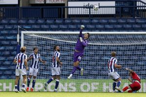 Josh Griffiths punches the ball clear for West Brom against Rayo Vallecano  (Photo by Adam Fradgley/West Bromwich Albion FC via Getty Images)