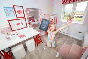Indie Steele in the bedroom she designed in the Lorimer showhome at Bellway’s Baldwins Gate Grange development in Baldwins Gate. The schoolgirl opened the showhome after winning a competition to design a child’s bedroom in the property