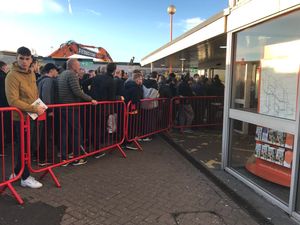 Football fans queueing at Wolverhampton station after Saturday's match