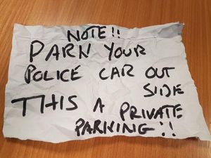 Supporting image for story: Police officers return to angry note left on vehicle after ‘life or death’ emergency
