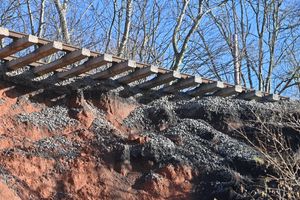 The landslide on the Severn Valley Railway, near to the Astbury Gold Course and Bridgnorth. Half of the edging stones on a bridge have gone aswell as the land. On some pics is local worker: Alex Stevens, he saw the landslide and was the one that called it in to the railway.