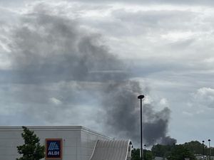 Supporting image for story: Crews work overnight to control yard fire involving 175 tons of coal dust 