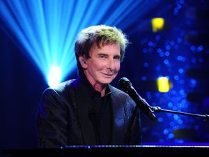 Supporting image for story: Barry Manilow’s 1.5 million-dollar bonus claim should be heard in US, court told