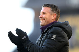 All smiles from Wolves boss Rob Edwards (Photo by Shaun Botterill/Getty Images)