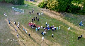 Drone view of assembly around the beacon