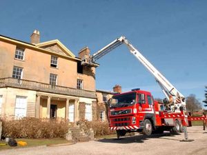 Supporting image for story: Crews tackle blaze at historic home