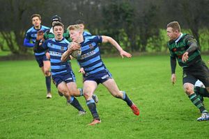 Market Drayton RFC (Green) v Shrewsbury (Blue) at Greenfields, Market Drayton. Shrewsbury's Joseph Hearle makes a break with the ball.