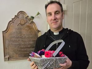Supporting image for story: Poppies on display in the Shropshire village church where the last surviving British Tommy of World War One was wed