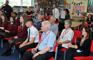 Students from The Priory School in Shrewsbury who have created an exhibition after learning about the holocaust thanks to a visit from writer Natalie Cumming who wrote the book The Fiddle. Pupils, staff and guests listening to poetry and readings the The Fiddle
