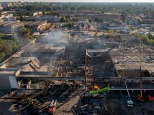 Supporting image for story: Rescuers search rubble of Ukraine shopping centre after Russian missile strike
