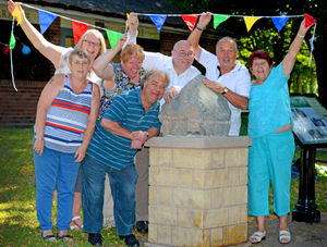 Members of the Friends of Buffery Park group with the stone