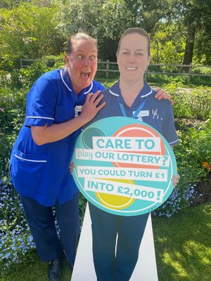 Nurse at Severn Hospice, Abi White (left) with the life-size cut-out.
