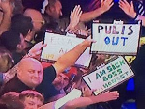 Supporting image for story: Cheeky fan reveals 'Pulis Out' banner aimed at West Brom boss during Grand Slam of Darts