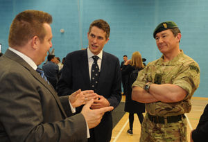 Defence Secretary Gavin Williamson with headteacher Mike Smith, and Brigadier Dave Kassapian