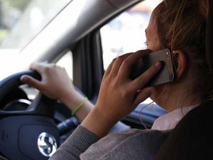 Supporting image for story: Poll: Is the law against drivers using a phone at the wheel enforceable?