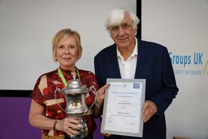 Sarah Kenny BHSEA Secretary collecting the Lord Cullen Trophy on behalf of Stop N Go from Colin Todd of the Humberside Safety Group
