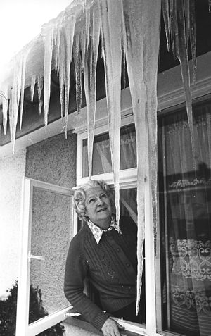 Molly Hatfield studies icicles at her home in Brookhouse Road, Oswestry