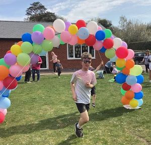 Pupils were doused in colourful powder paint.
