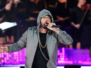 Eminem performs on stage