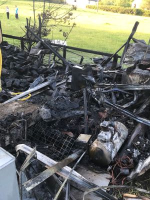 The gutted shed. Photo: @SFRS_Clun