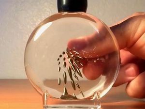 Supporting image for story: Watch this mesmerising video of a gold ferrofluid display