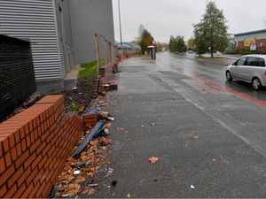 Supporting image for story: Photos from scene of fatal Oldbury crash show demolished wall and car debris