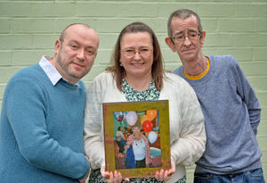 Evelyn's children Michelle and Alan with family friend Stephen Young