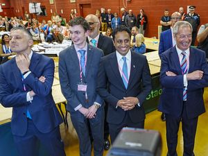 Reform UK leader Nigel Farage (right) and chairman Zia Yusuf (second right) talk to the media after the party's victory in the Runcorn and Helsby by-election